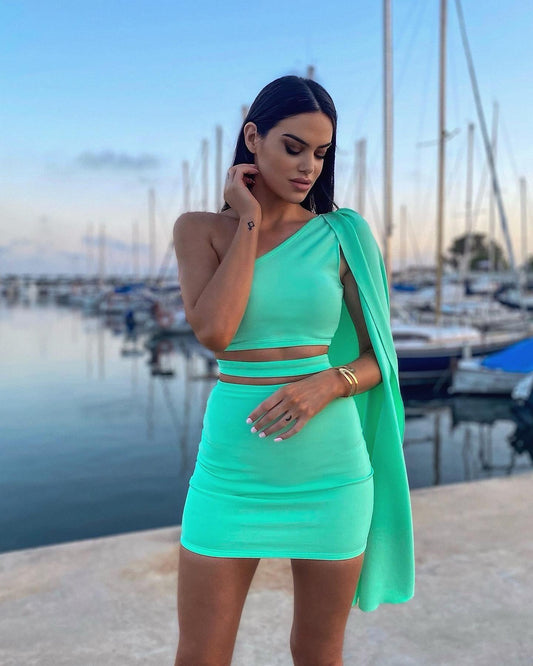 Cut-out mini dress with cape sleeve detail in mint green color