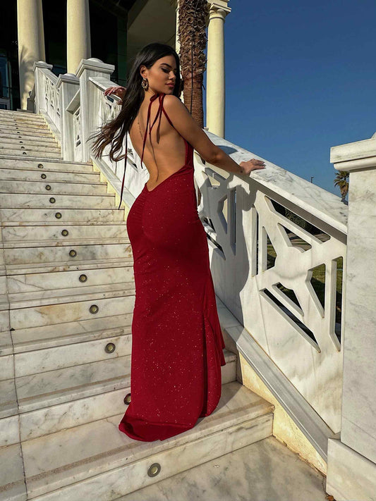 red backless long prom dress with glittery details